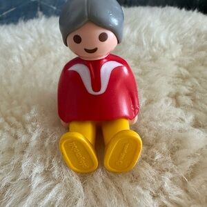 Bright Red and Yellow Action Figure Toy